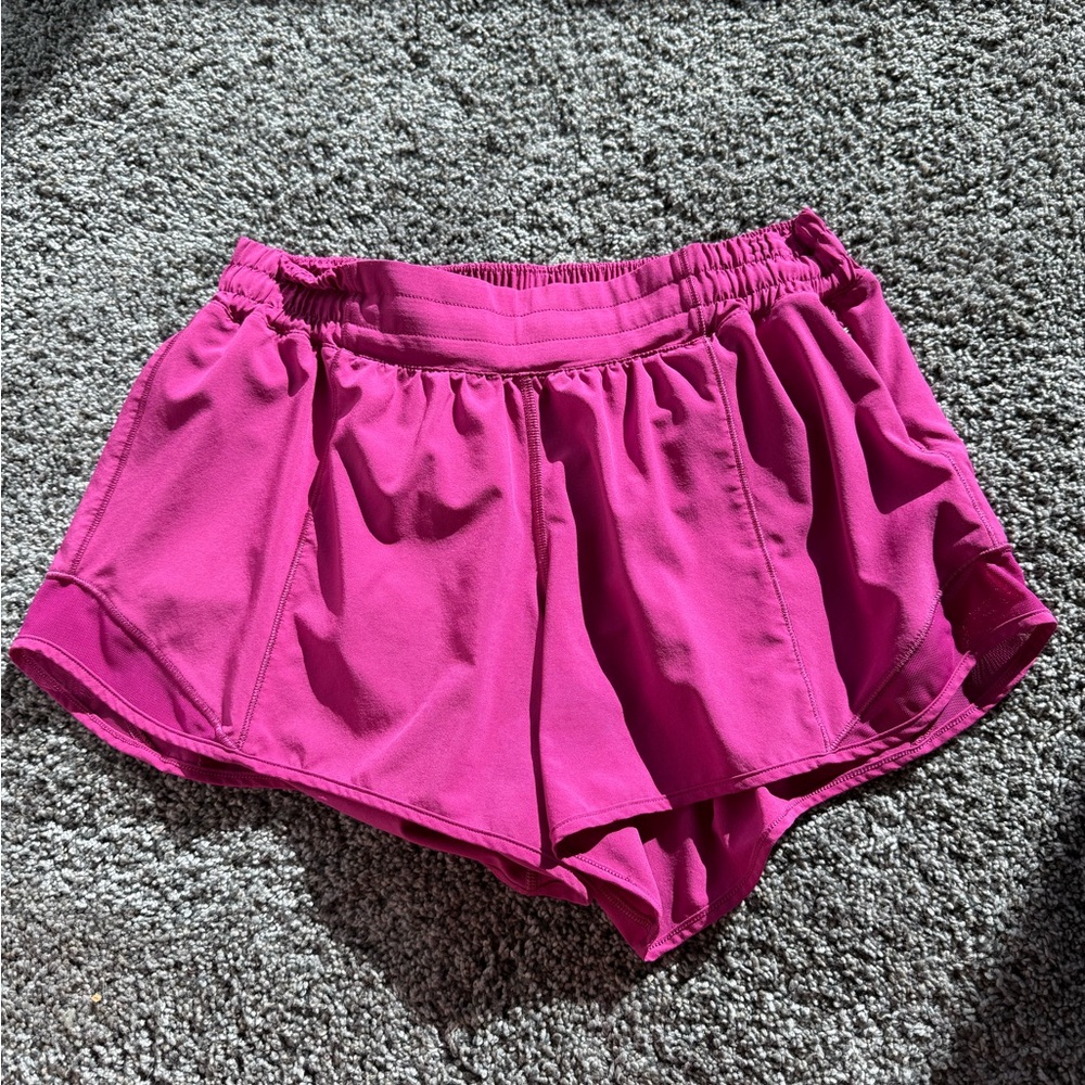 Rare dark pink lululemon size 8 hotty hot 4 inch shorts!!